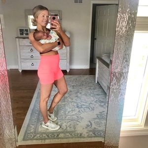 Neon orange and yellow ribbed bike shorts